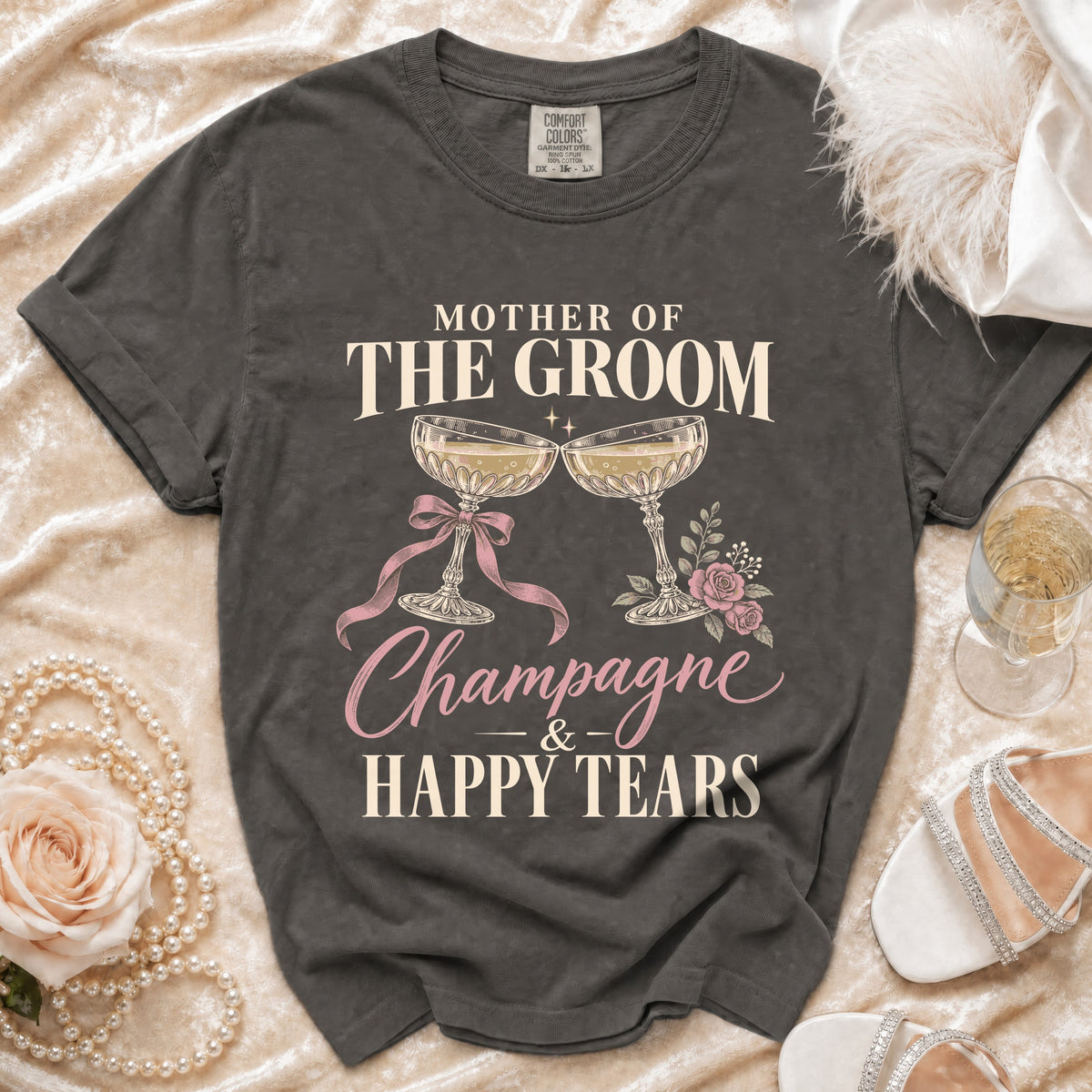 Dark grey t-shirt with "Mother of the Groom, Champagne & Happy Tears" text.