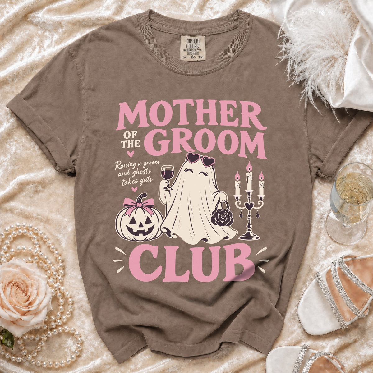 Brown t-shirt with pink text: "Mother of the Groom Club" featuring a ghost.