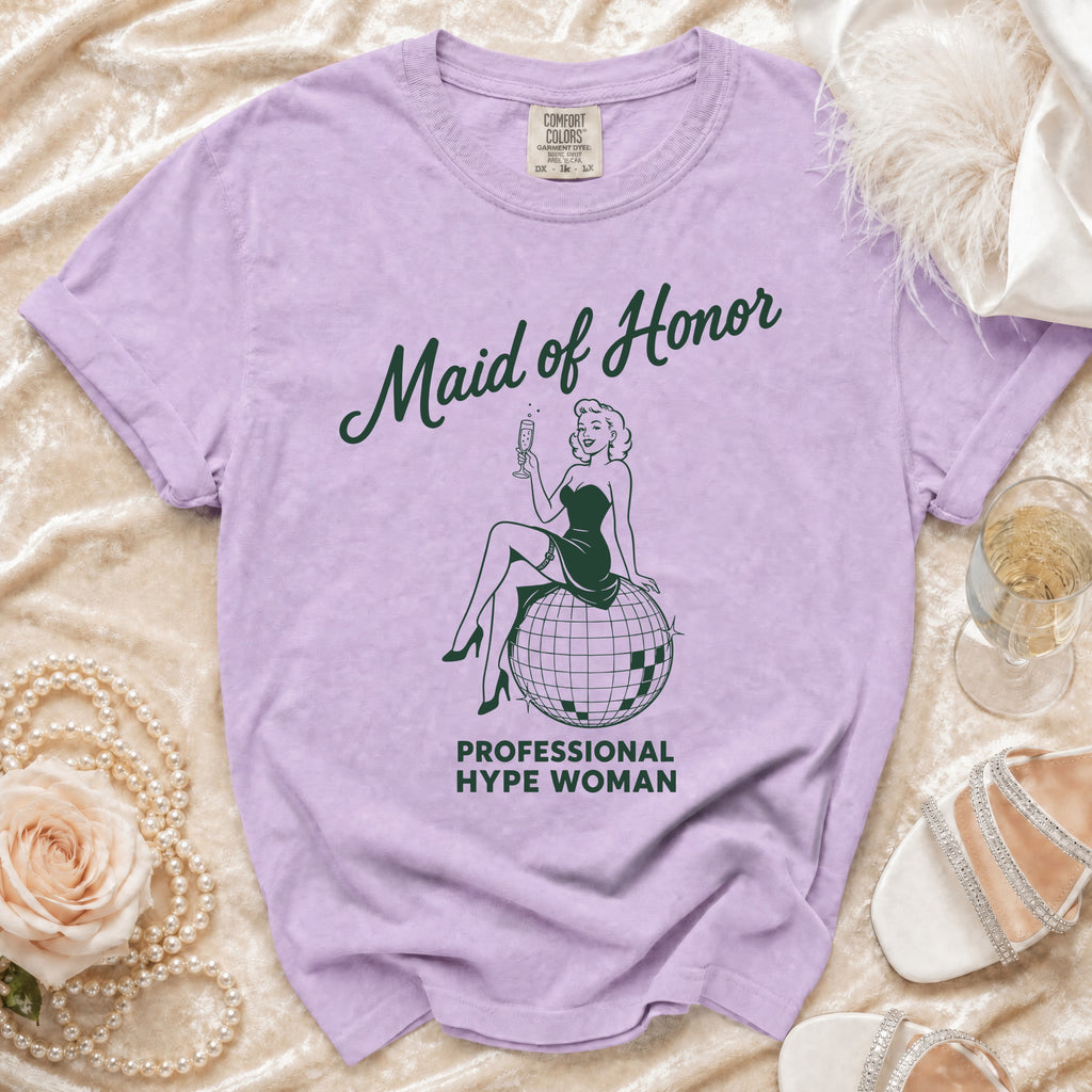 Maid of Honor t-shirt with a woman sitting on a disco ball graphic.