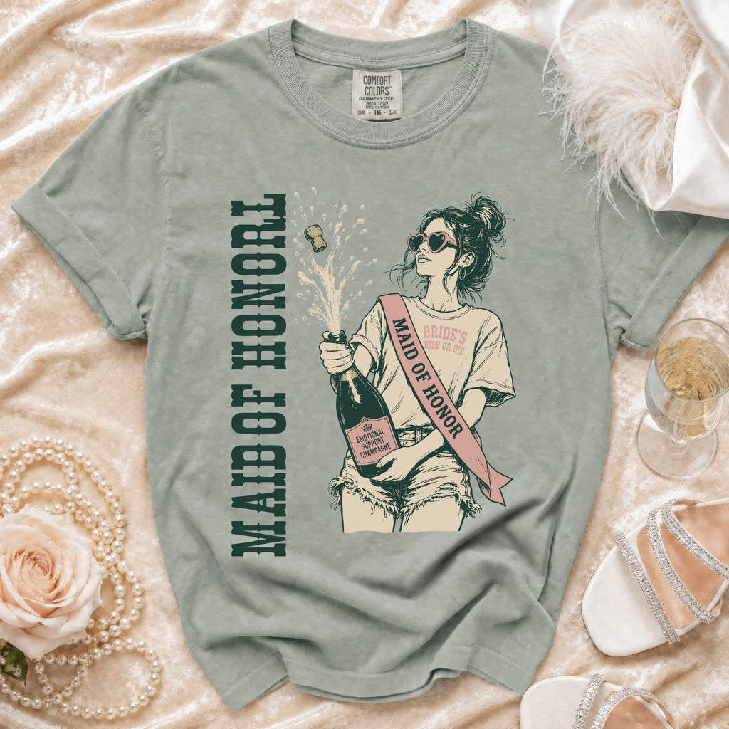 Green t-shirt with "Maid of Honor" and champagne bottle graphic.