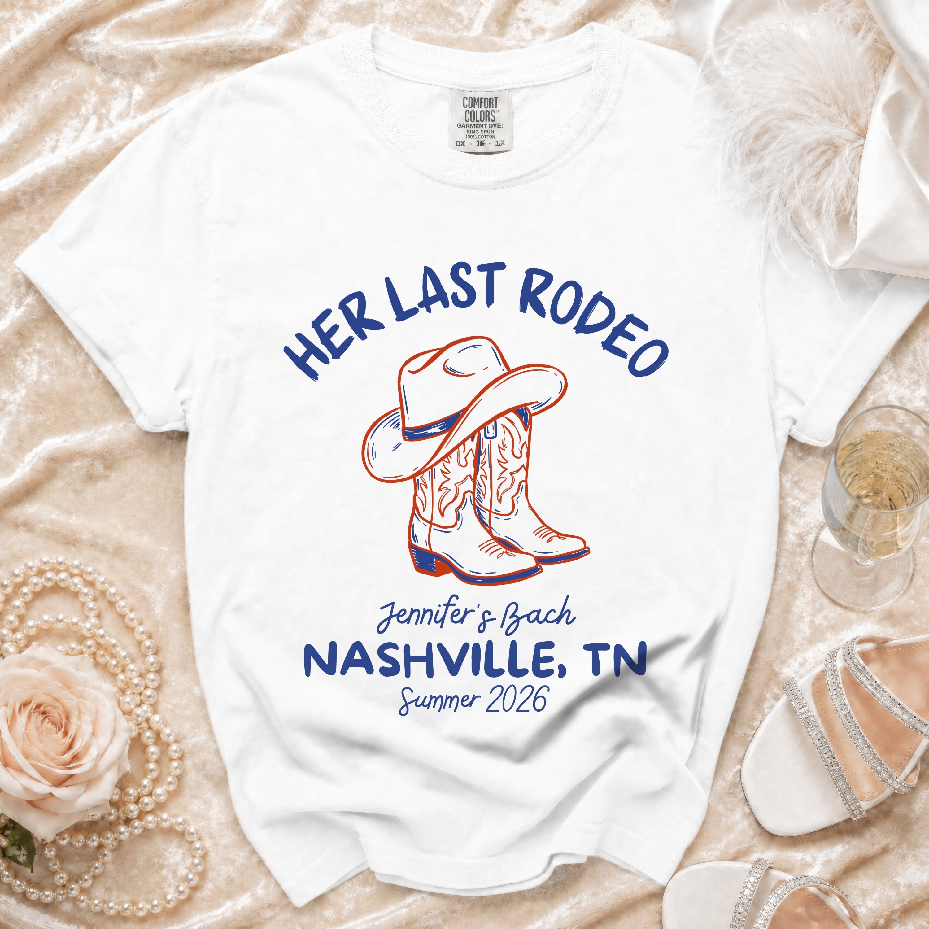 White t-shirt with "Her Last Rodeo" text, cowboy boots, and Nashville, TN summer 2026.
