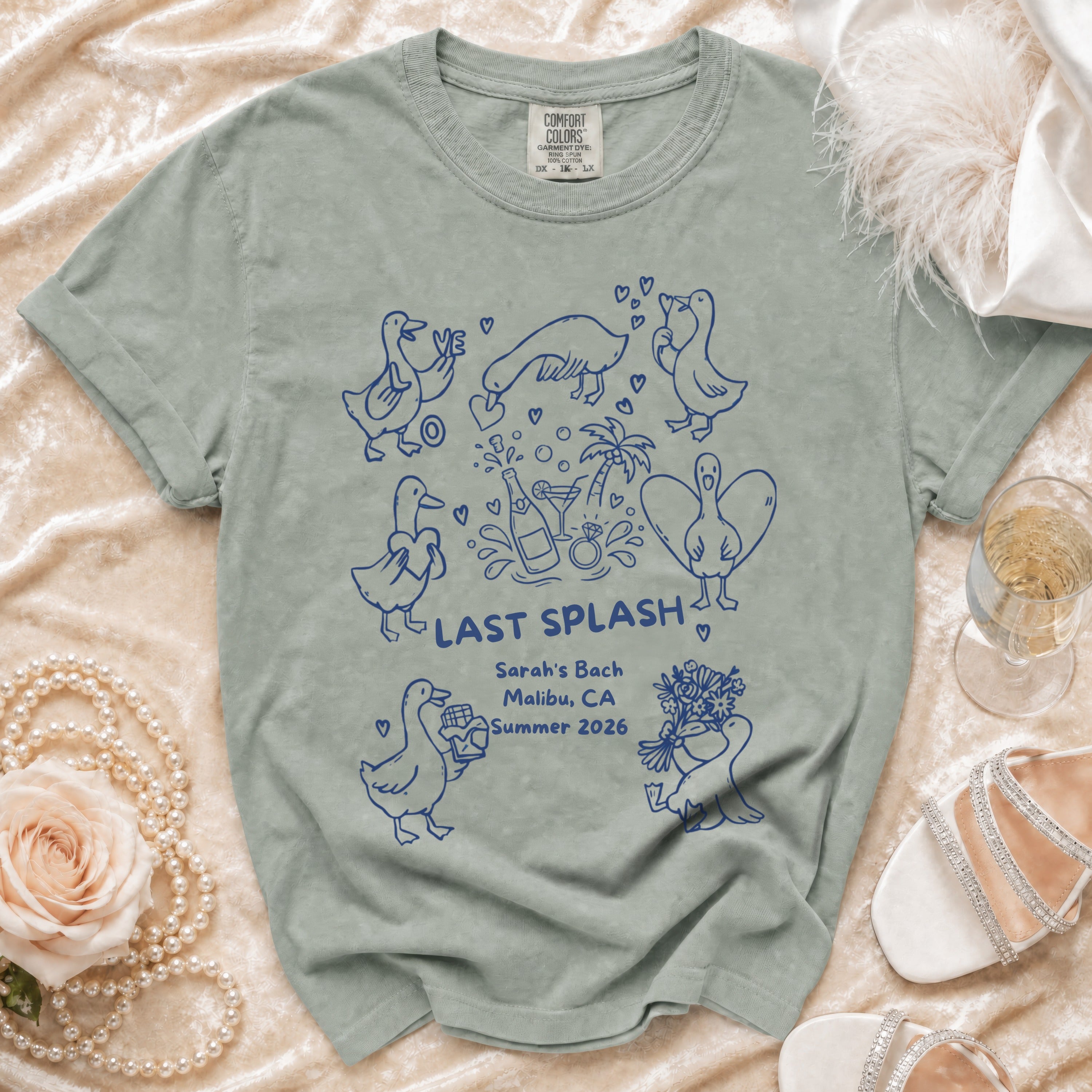 T-shirt with cartoon ducks and "Last Splash Sarah's Bach Malibu, CA Summer 2026" text.