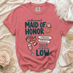 "Professional Maid of Honor" T-shirt with graphics of a ring, bouquet, and champagne glass.