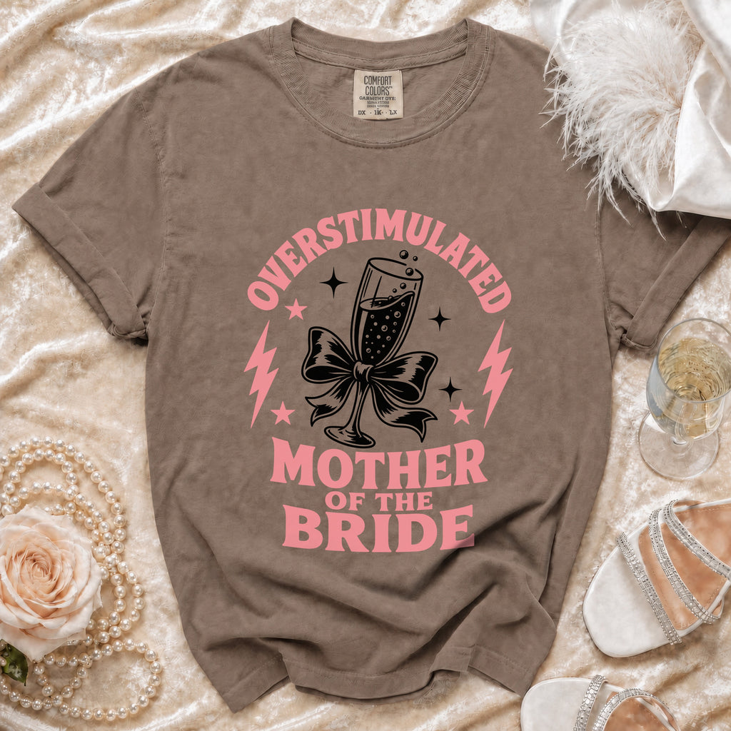 Brown t-shirt with "Overstimulated Mother of the Bride" text and champagne glass graphic.