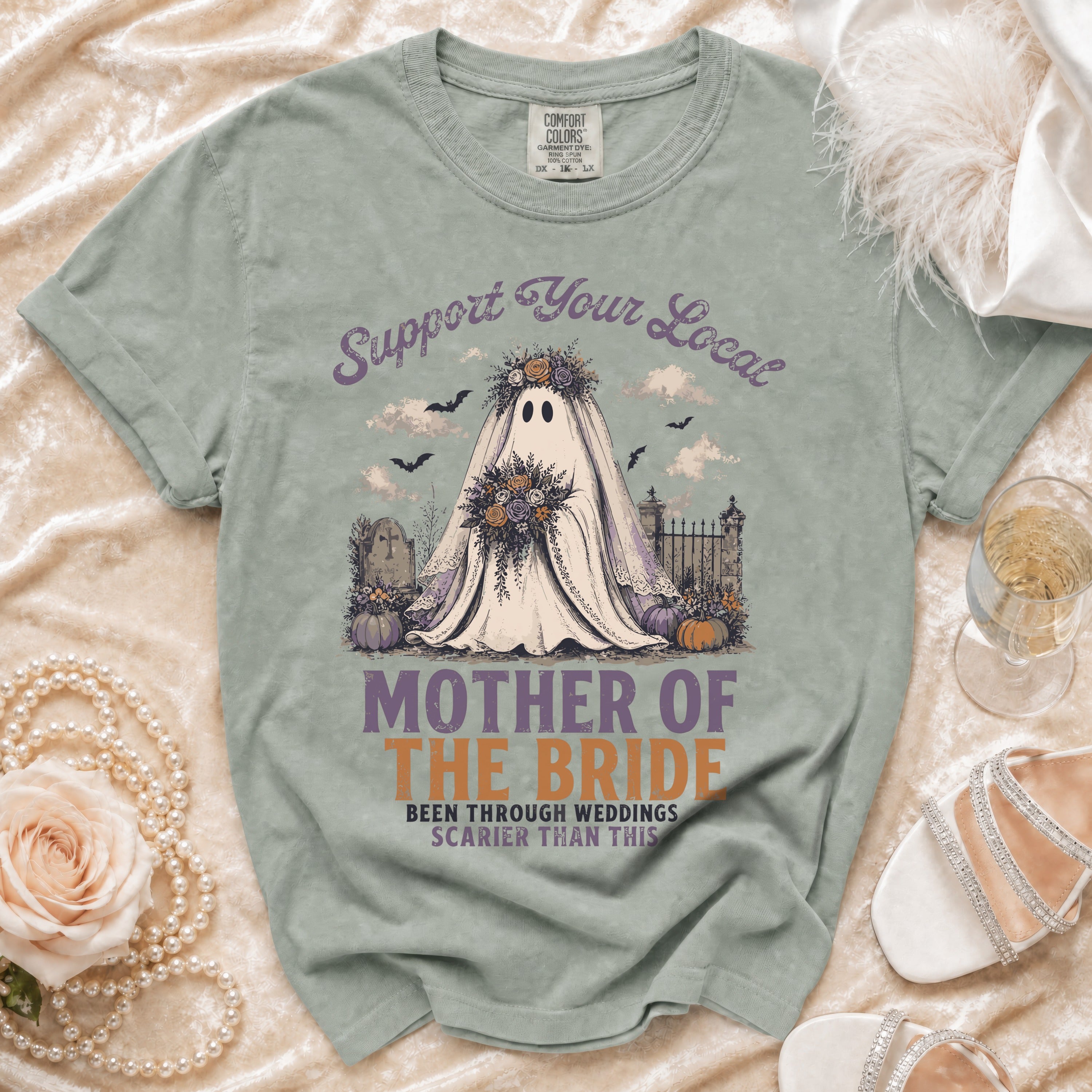 Ghost in bridal veil holding flowers, "Mother of the Bride" text.