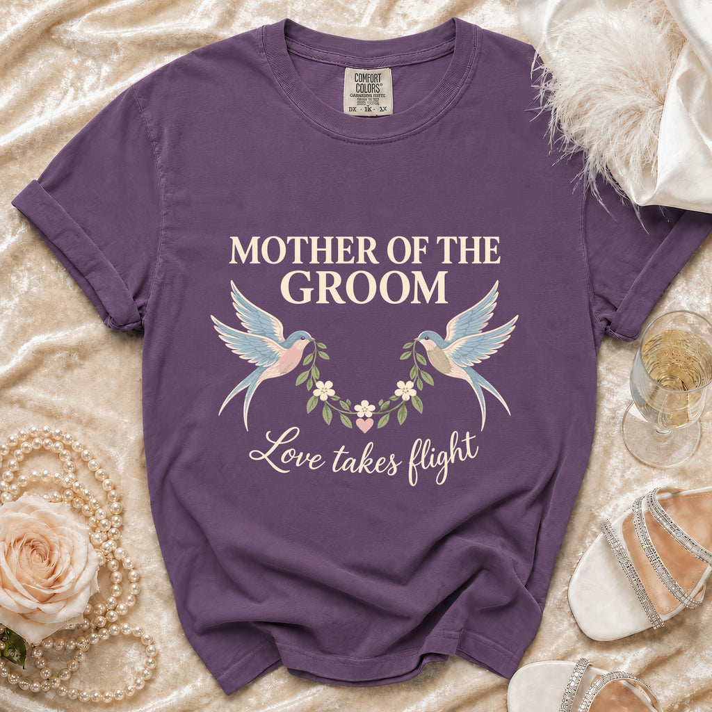 Purple t-shirt with "Mother of the Groom" and "Love takes flight" text.
