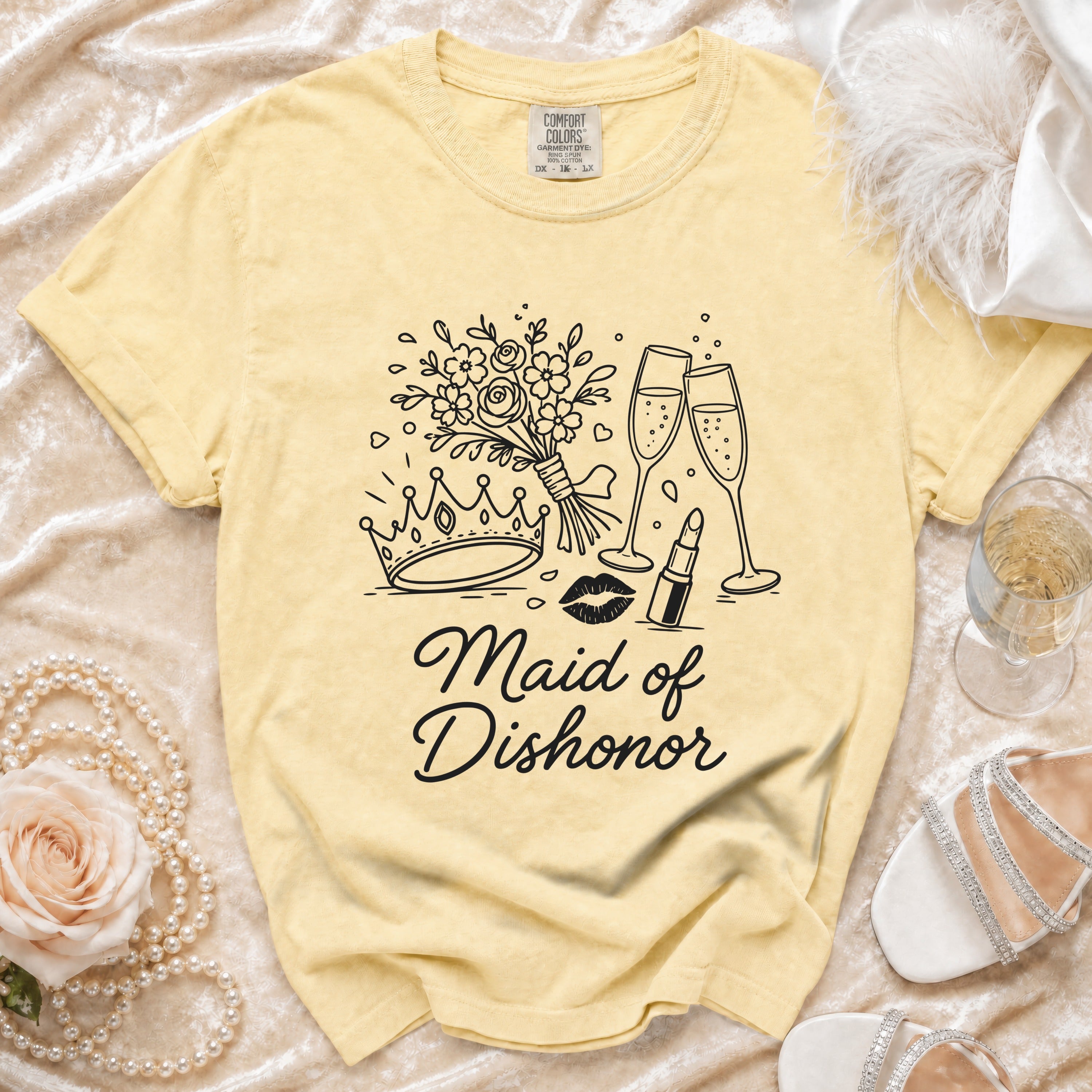 Yellow t-shirt with "Maid of Dishonor" text and outline graphics.
