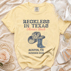 Yellow t-shirt with "Reckless in Texas Olivia's Bach" and Austin, TX Summer 2026.