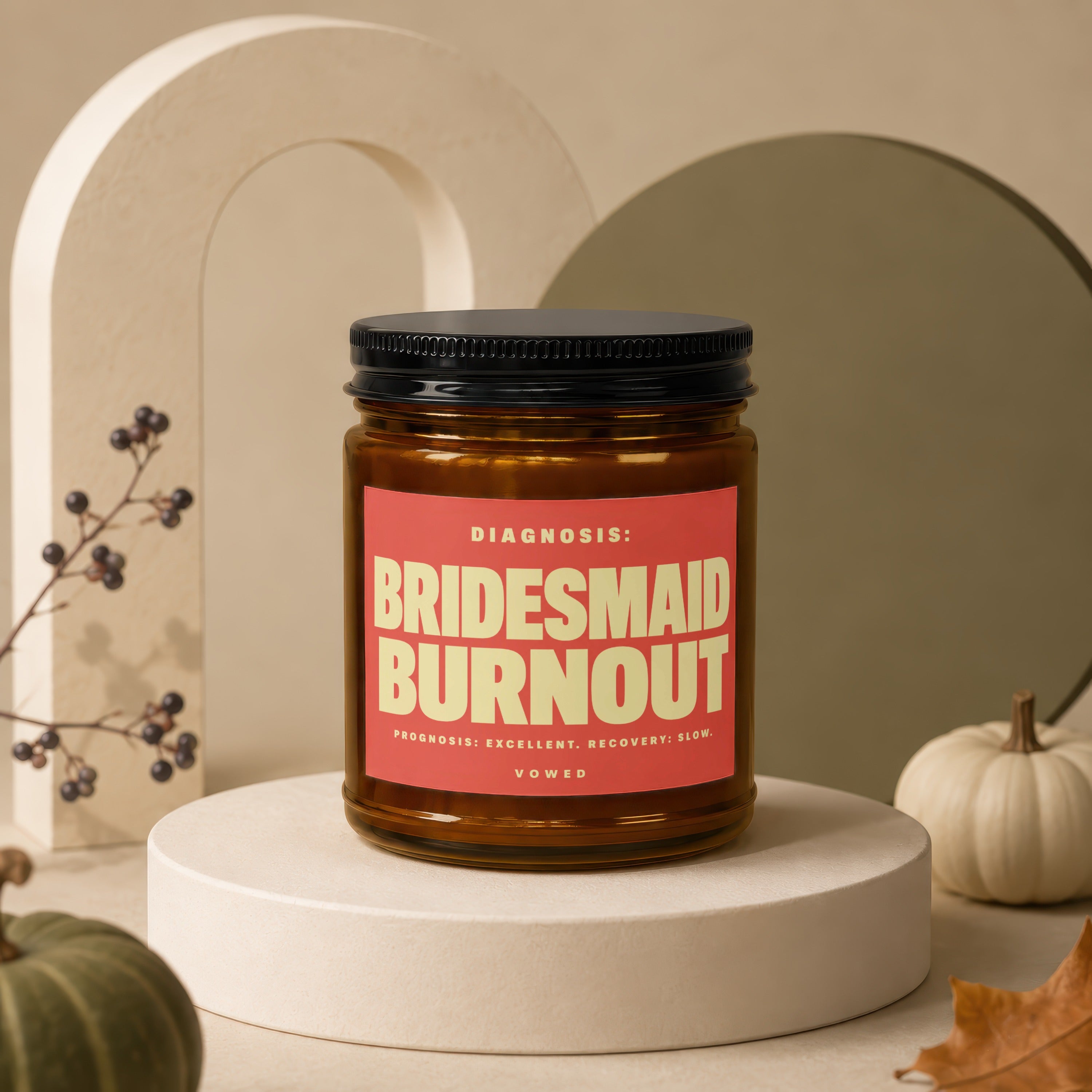 Amber glass candle with "Bridesmaid Burnout" label, "Vowed" text.