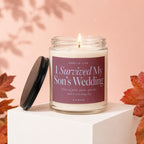 Candle that says "I Survived My Son's Wedding" and "VOWED"