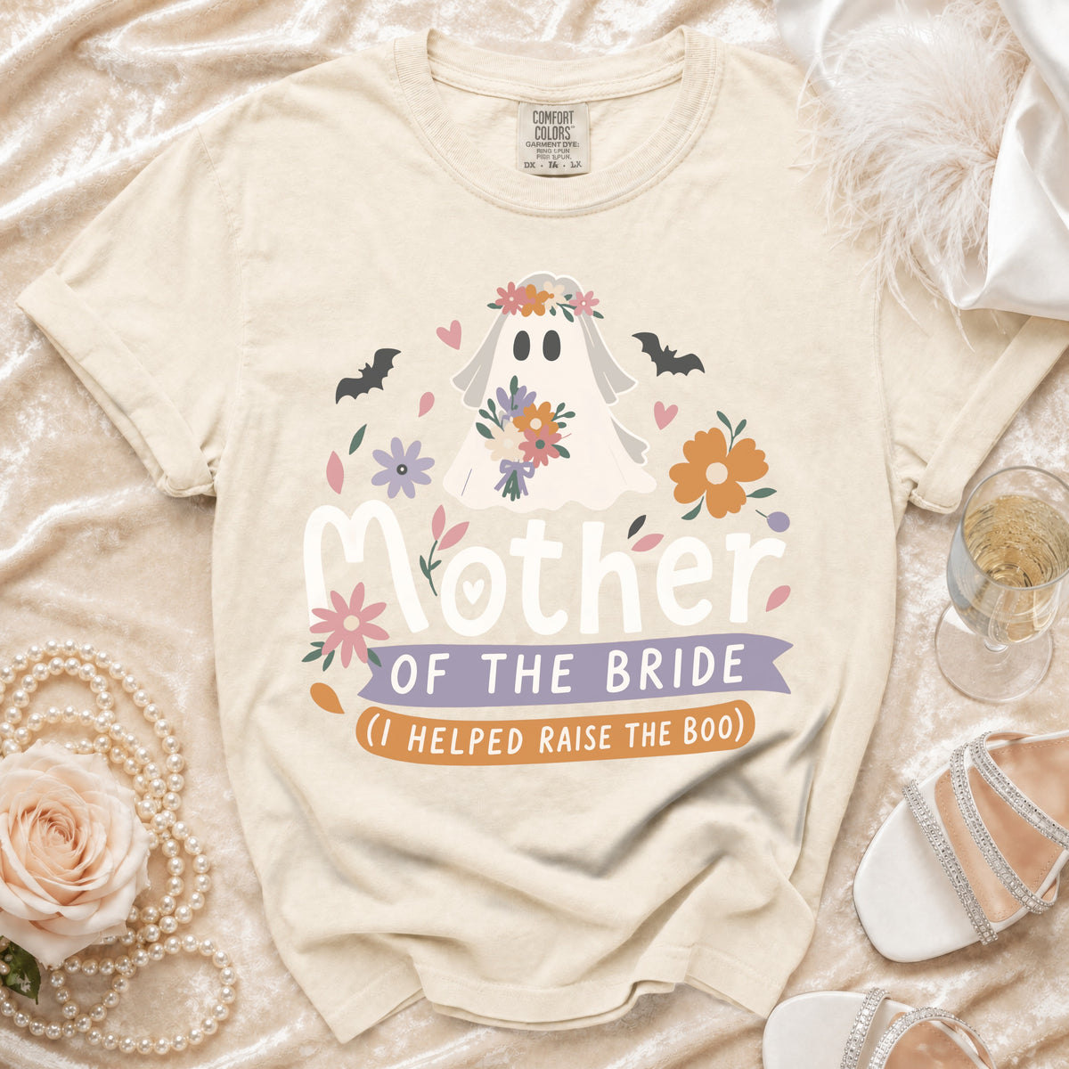 Cream t-shirt with "Mother of the Bride (I helped raise the boo)" graphic and a ghost.