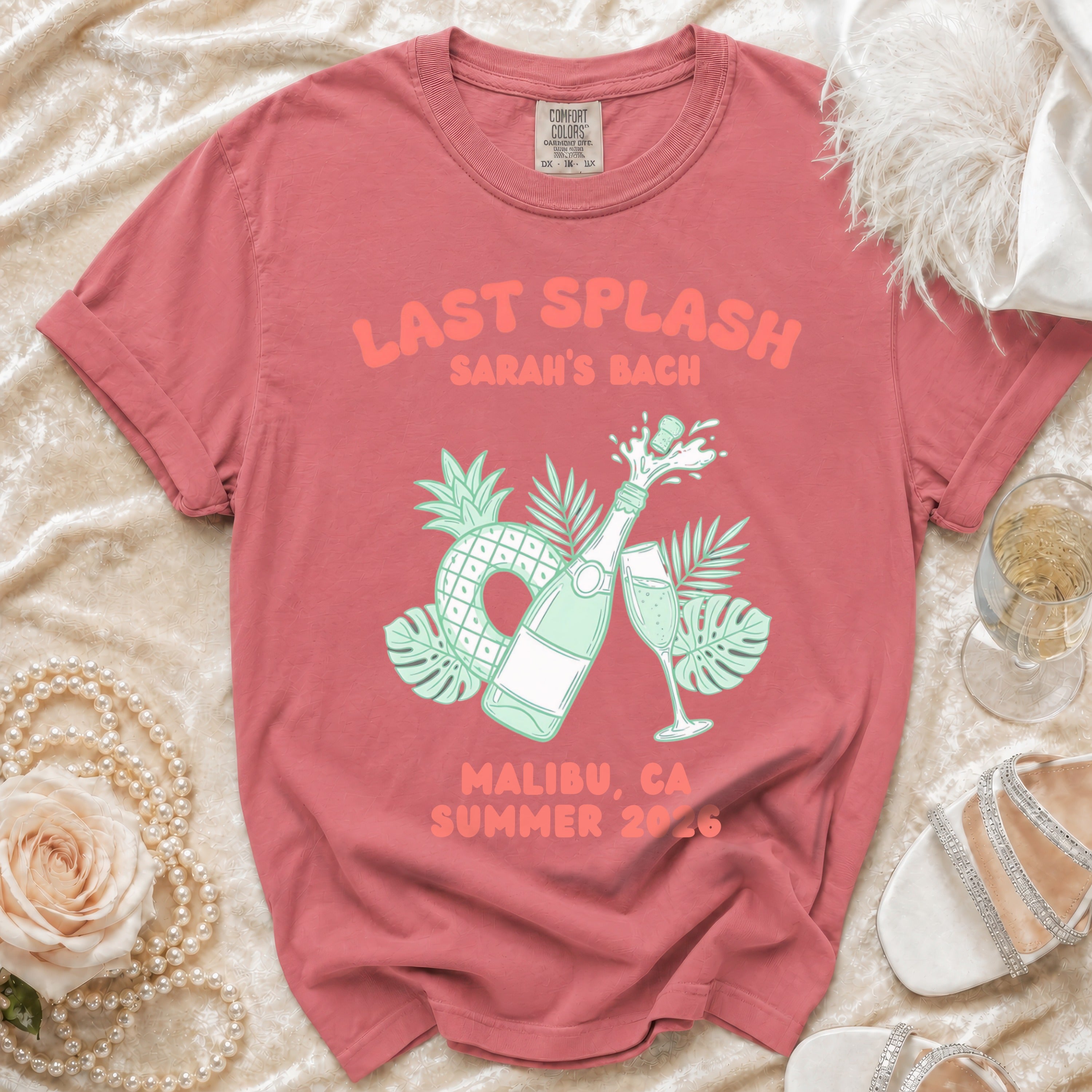 Coral t-shirt with "Last Splash Sarah's Bach Malibu CA Summer 2026" text and champagne graphic.