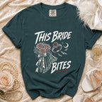Teal t-shirt with "This Bride Bites" text, roses, ring, and bats graphic.