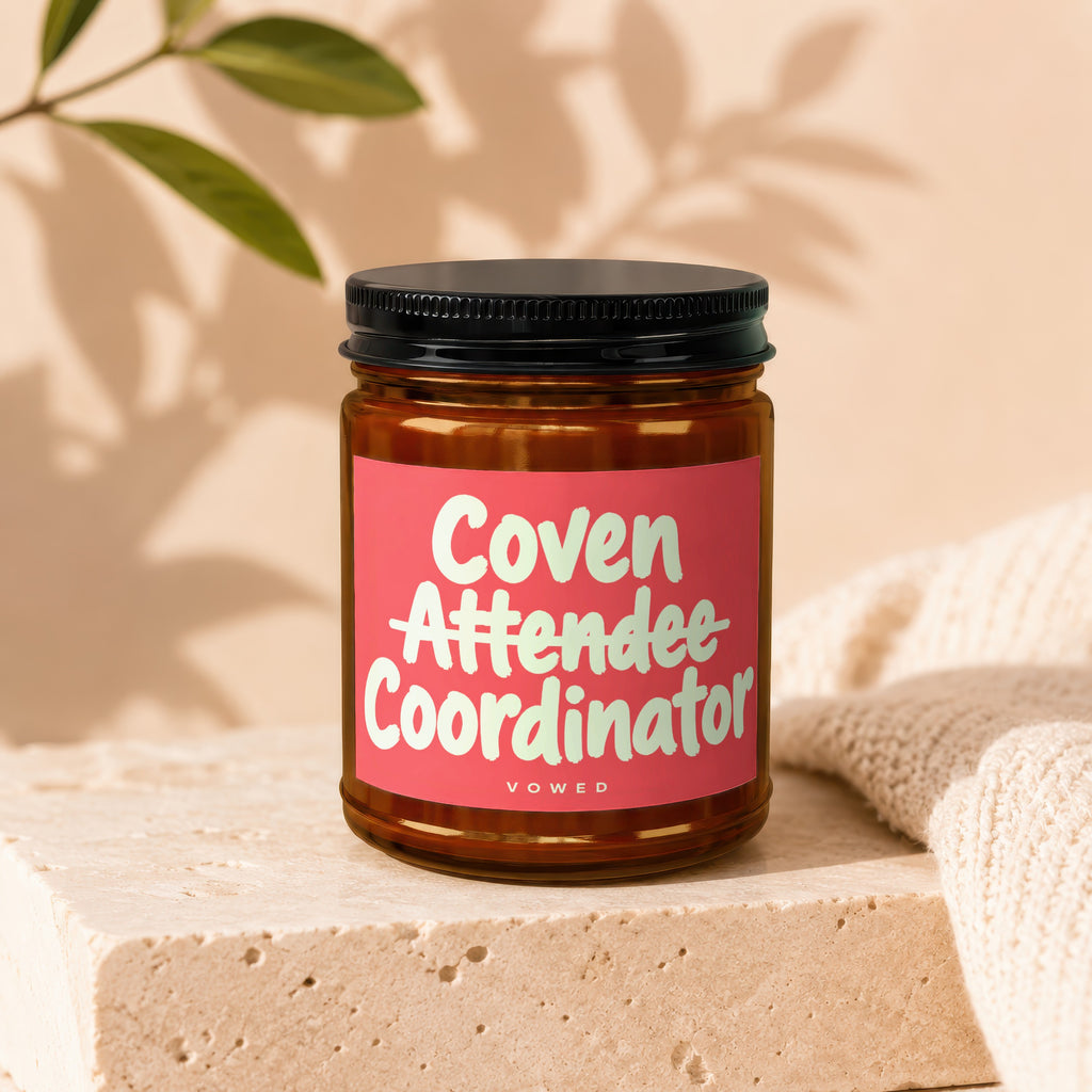 Candle labeled "Coven Attendee Coordinator" by Vowed.