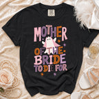 Black t-shirt with "Mother of the Bride to Die For" text and ghost graphic.