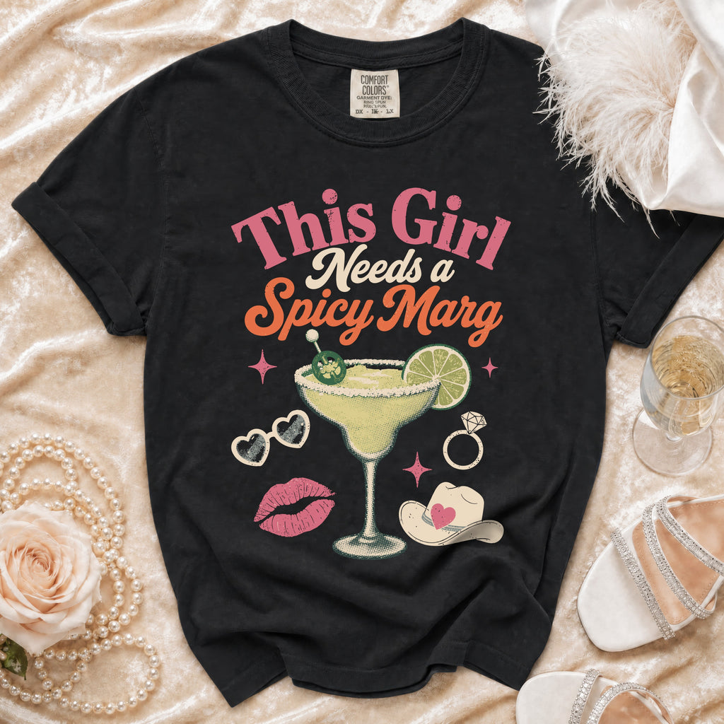 Black t-shirt with "This Girl Needs a Spicy Marg" graphic and margarita.