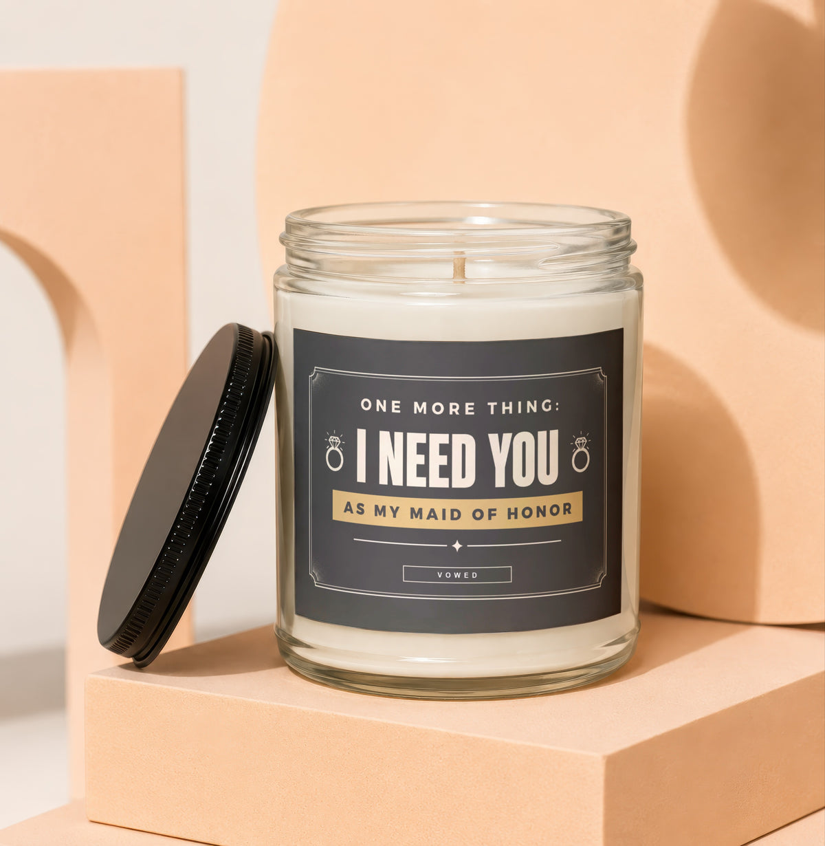 Glass candle with "I Need You As My Maid of Honor" text on label.