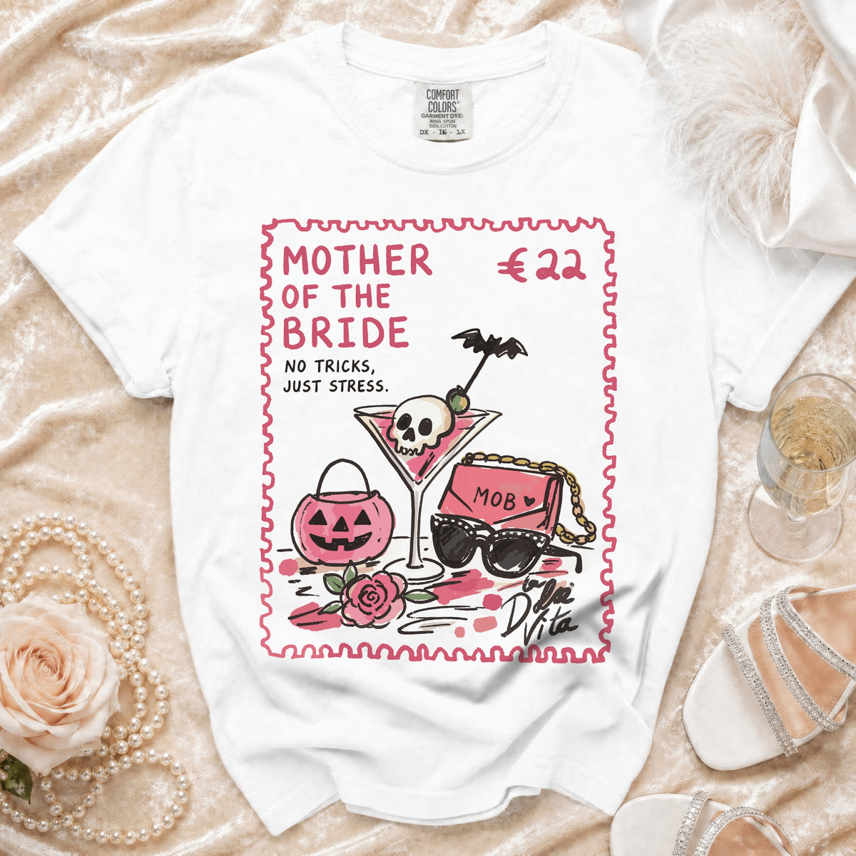 White t-shirt with "Mother of the Bride" design and price tag.