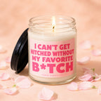 Glass candle with pink label that reads "I CAN'T GET HITCHED WITHOUT MY FAVORITE B*TCH".