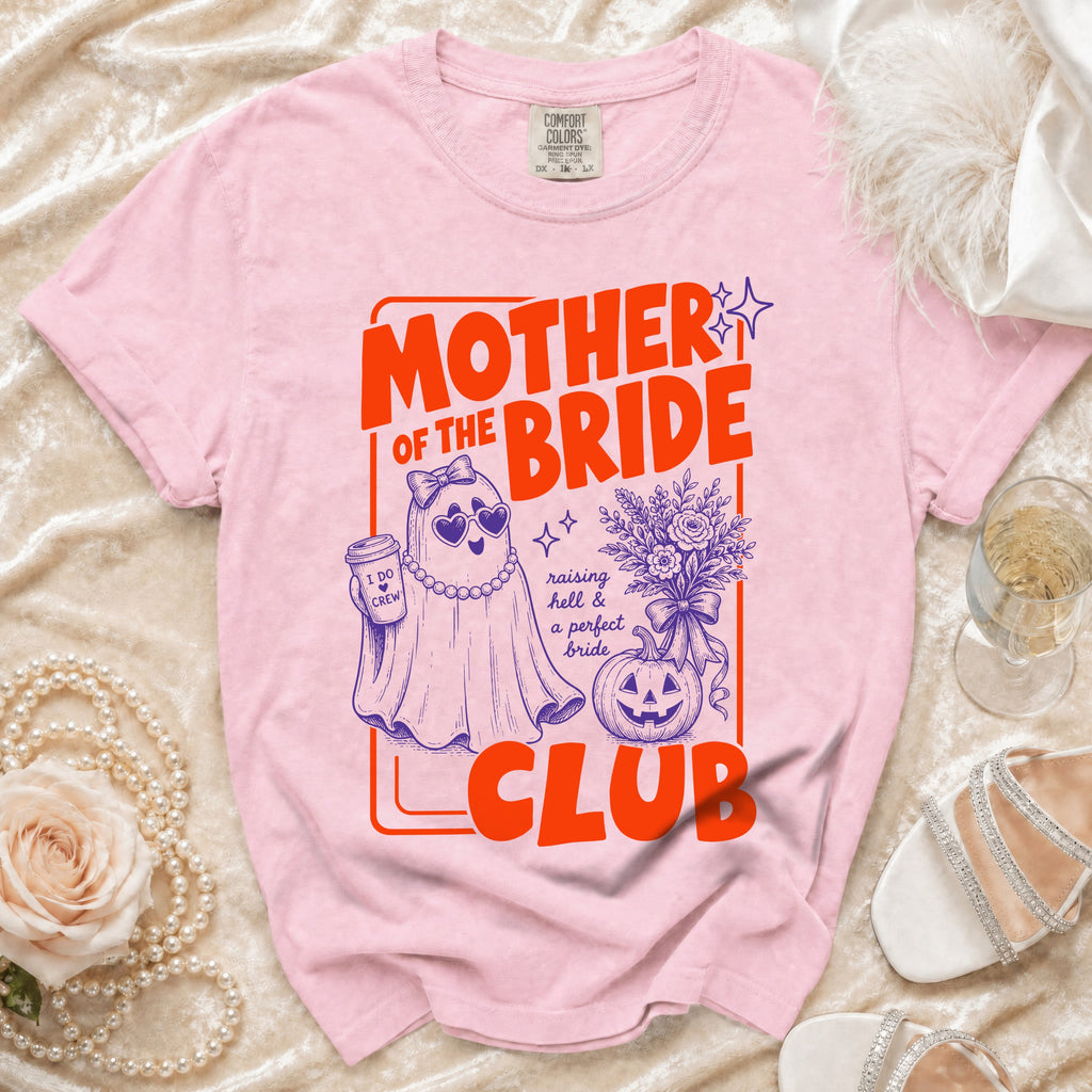 Pink t-shirt with "Mother of the Bride Club" graphic featuring a ghost and pumpkin.