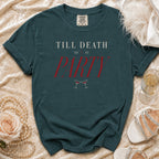 Teal t-shirt with "Till Death Do Us Party" text and champagne glasses.