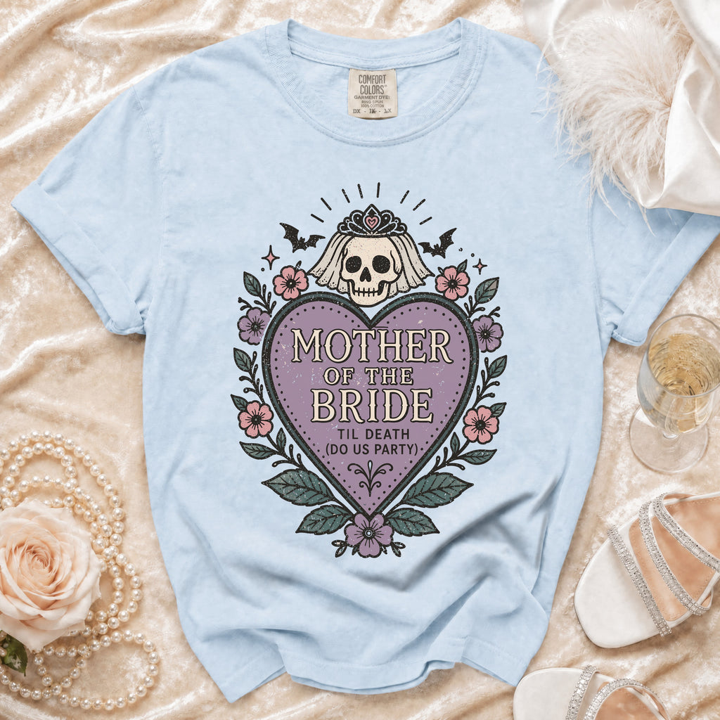 Light blue t-shirt with "Mother of the Bride" skull graphic and text.