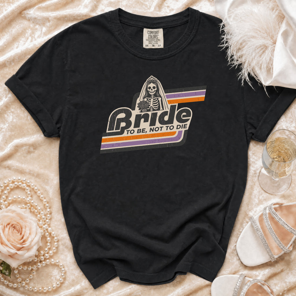 Black t-shirt with skeleton bride graphic reading "Bride to Be, Not to Die."