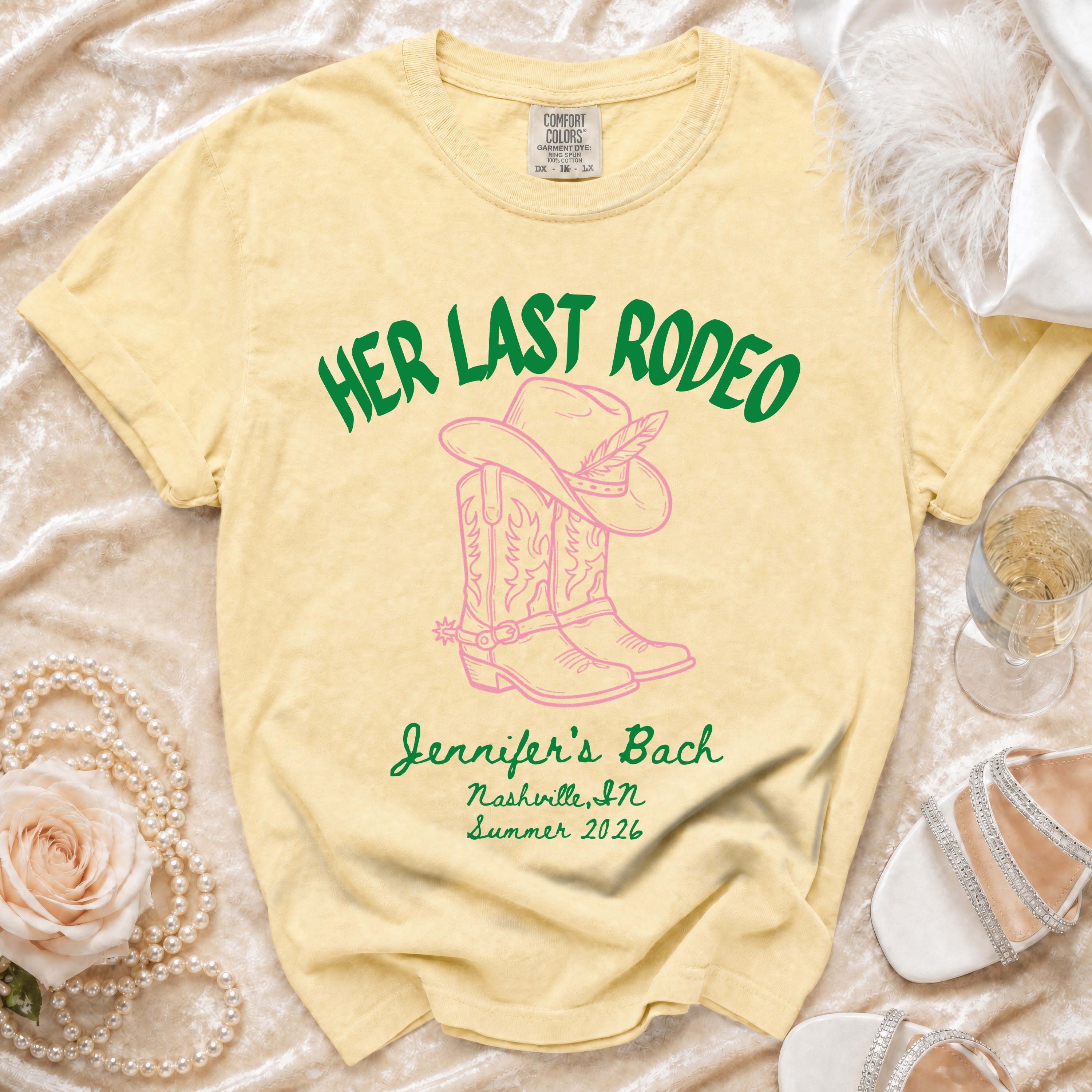 Yellow t-shirt with "Her Last Rodeo" and cowboy boots design.
