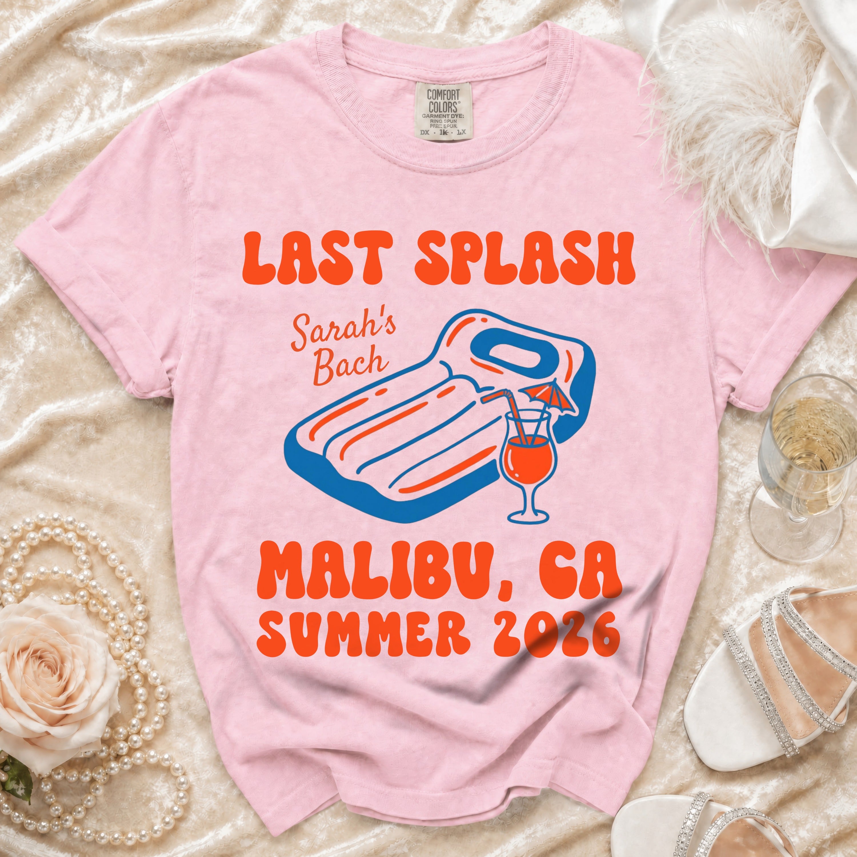 Pink t-shirt with "Last Splash Sarah's Bach Malibu, CA Summer 2026" graphic.