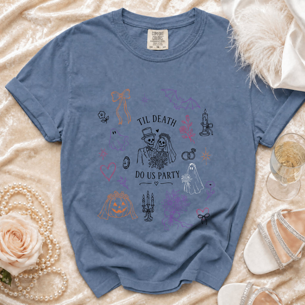 Blue t-shirt with "Til Death Do Us Party" graphic featuring skeletons, ghosts, and wedding elements.