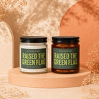 Two candles labeled "Raised the Green Flag" and "Official Maid of Honor" displayed.