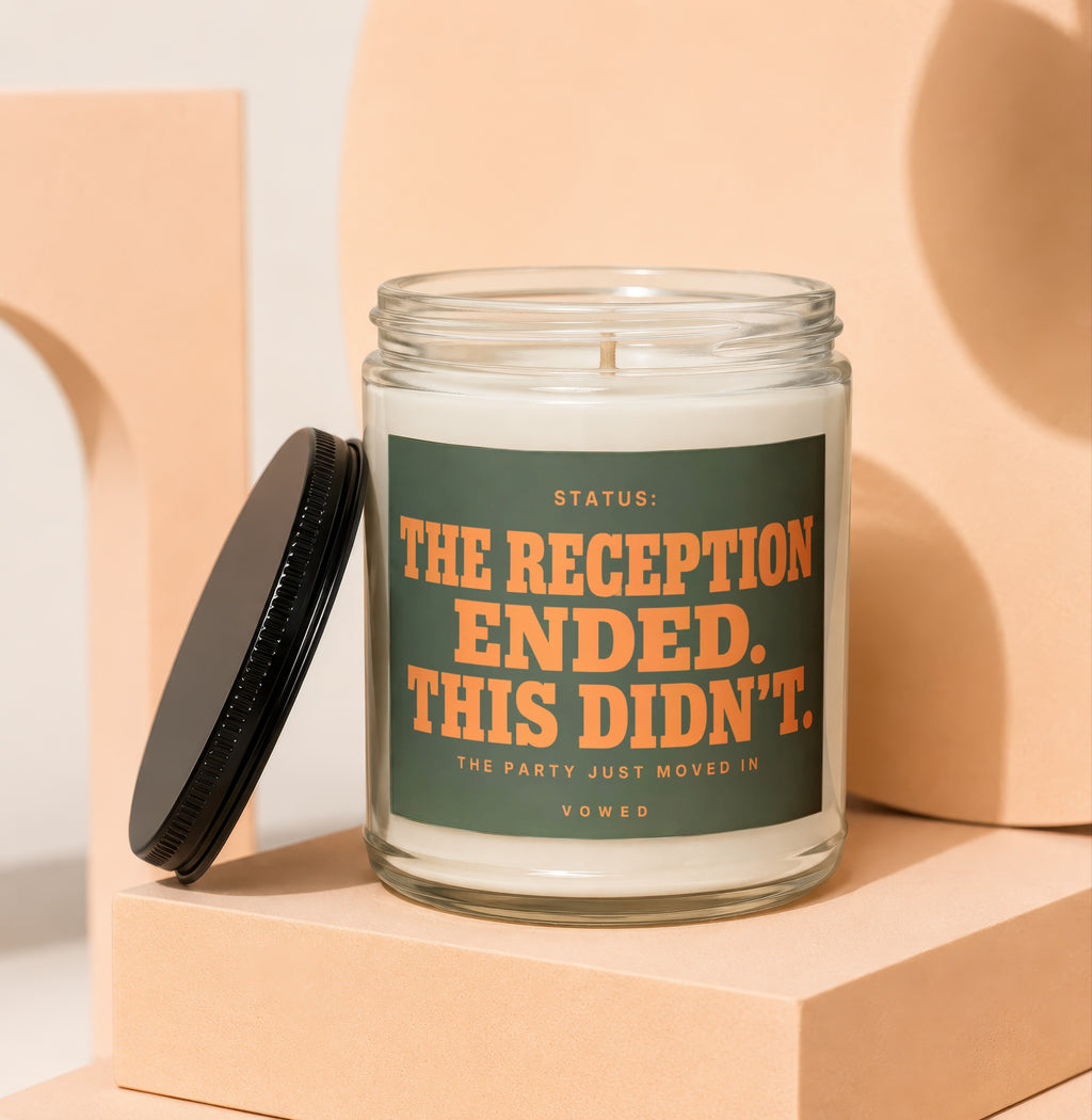 Candle with "The Reception Ended. This Didn't." text on the label.