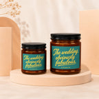 Two amber glass jar candles with "The wedding, obviously fabulous" text.