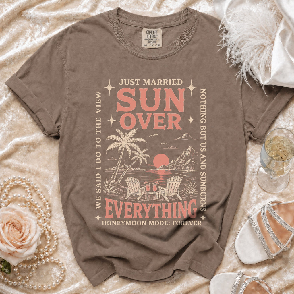 Just Married Sun Over Everything slogan tee with beach scene graphic and text.