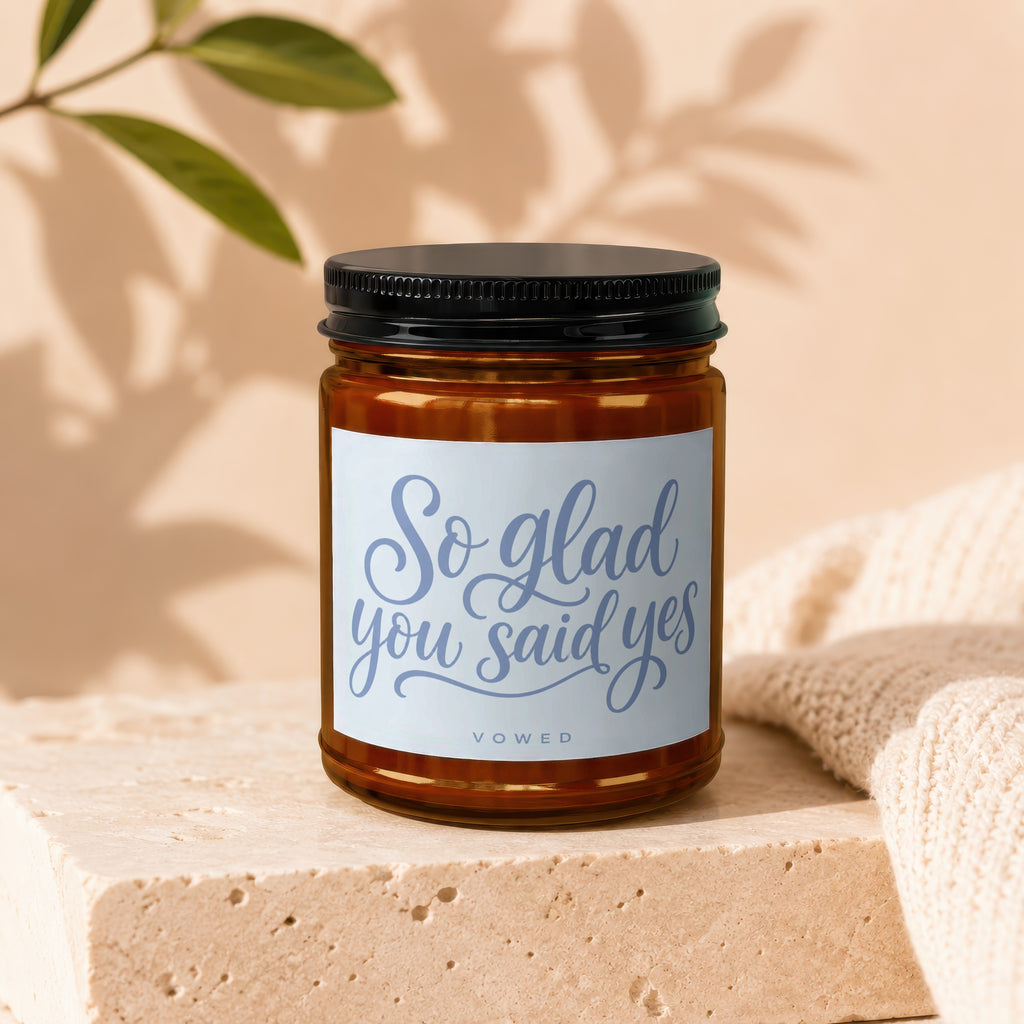 Anchor candle with "So glad you said yes" text on label.