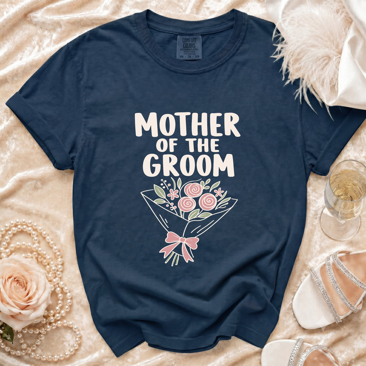 Navy t-shirt with "Mother of the Groom" text and floral bouquet graphic.