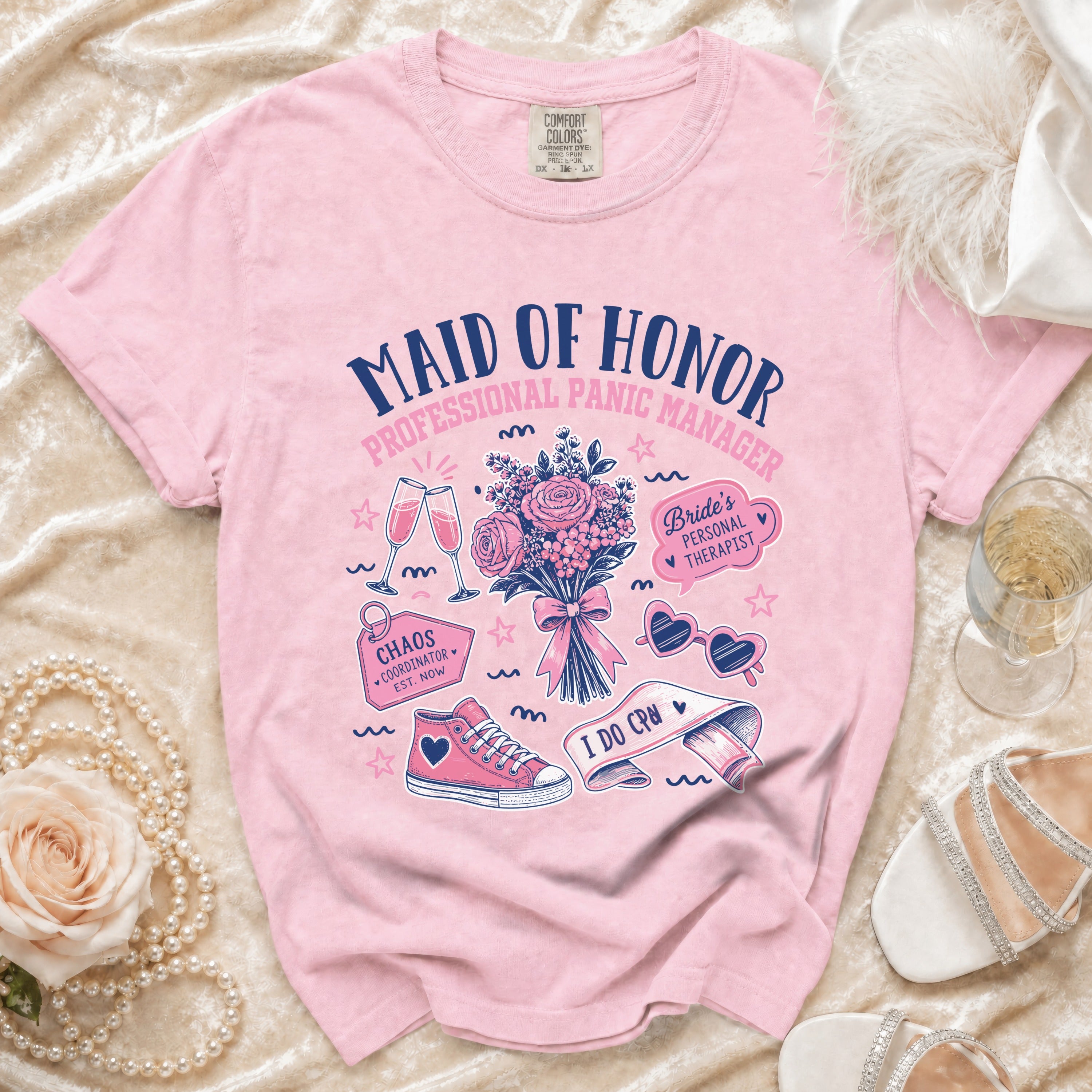 Pink t-shirt with "Maid of Honor Professional Panic Manager" and bridal graphics.