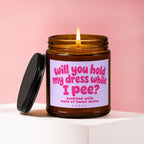 Amber jar candle with lit wick, "Will you hold my dress while I pee?" text