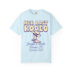 Light blue t-shirt with "HER LAST RODEO" text and cowboy boot graphic.