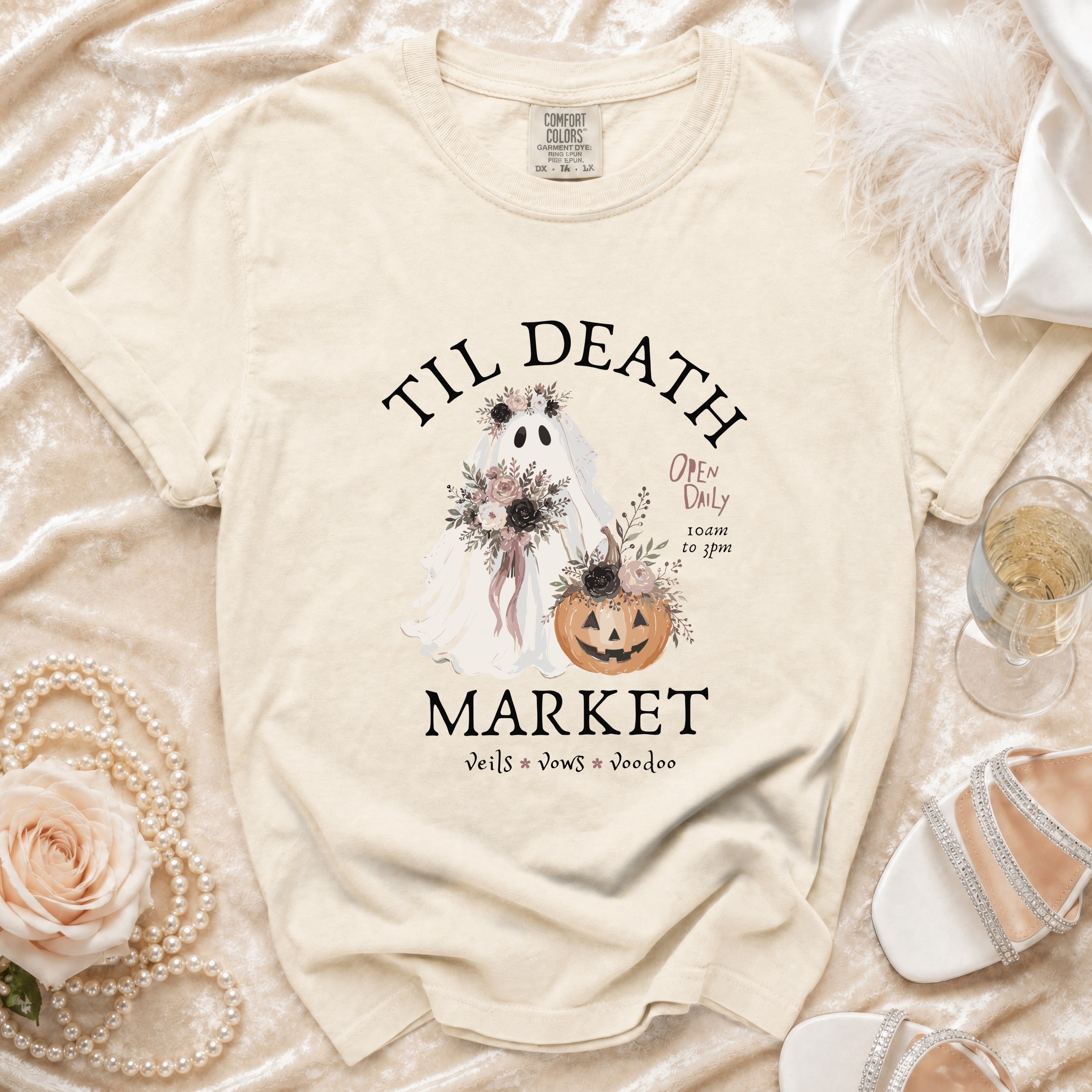 T-shirt with ghost, pumpkin, flowers, and text "Til Death Market".