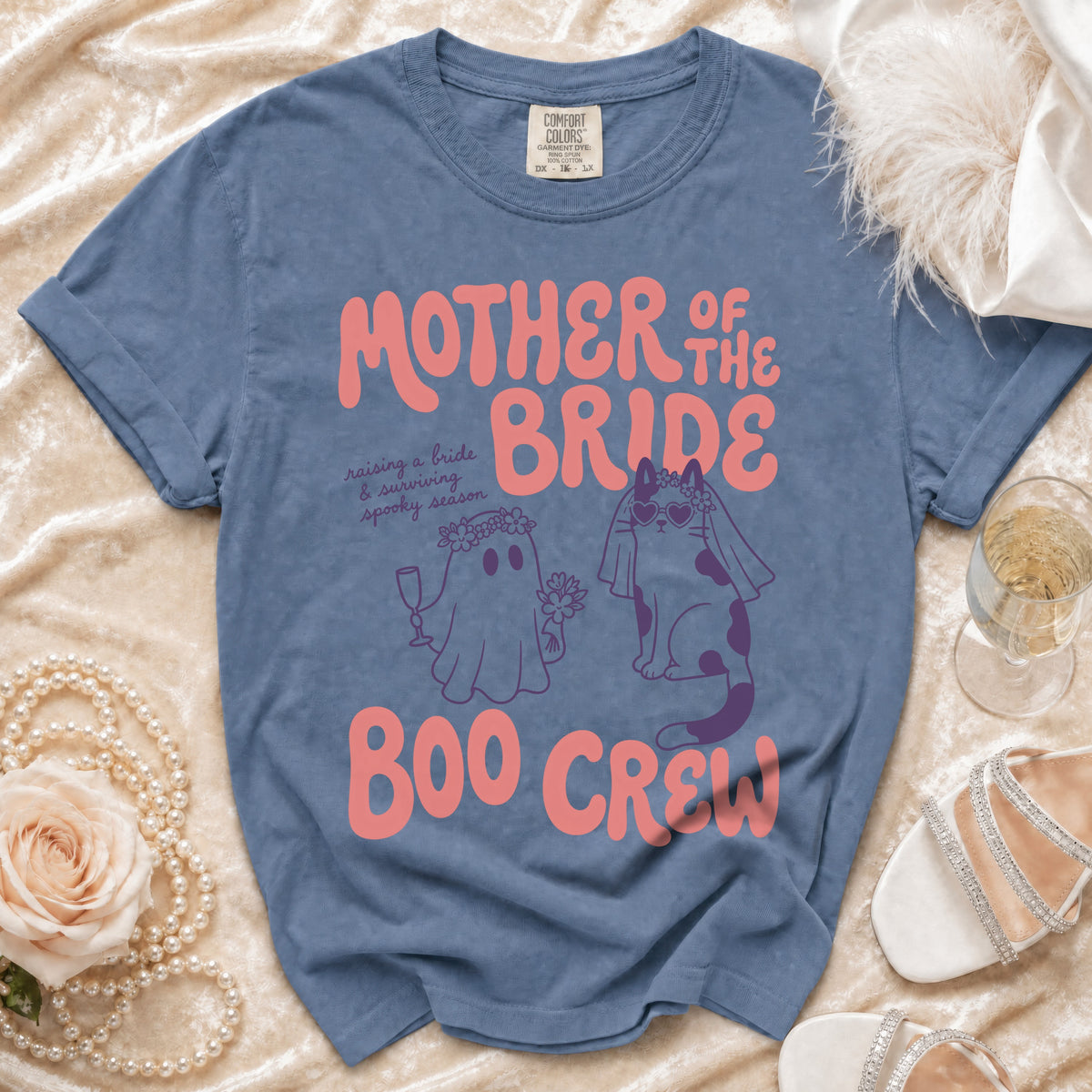Blue t-shirt with "Mother of the Bride Boo Crew" text and ghost/cat graphics.