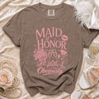 Maid of Honor Obviously t-shirt with pink graphic of flowers, champagne, and makeup.