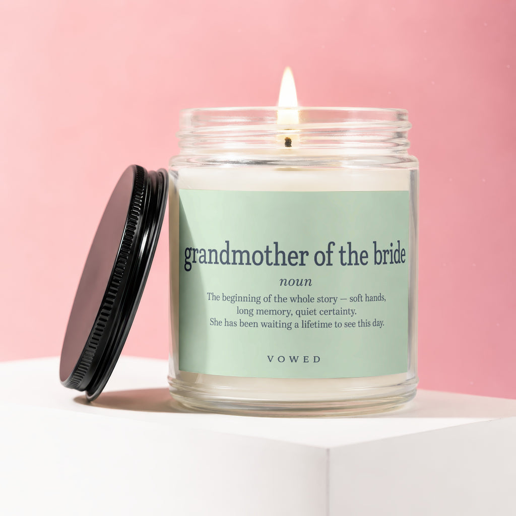 Candle labeled "grandmother of the bride" with descriptive text, lid off.