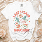 White t-shirt with "Last Splash Sarah's Bach Malibu CA Summer 2026" and flamingo graphic.