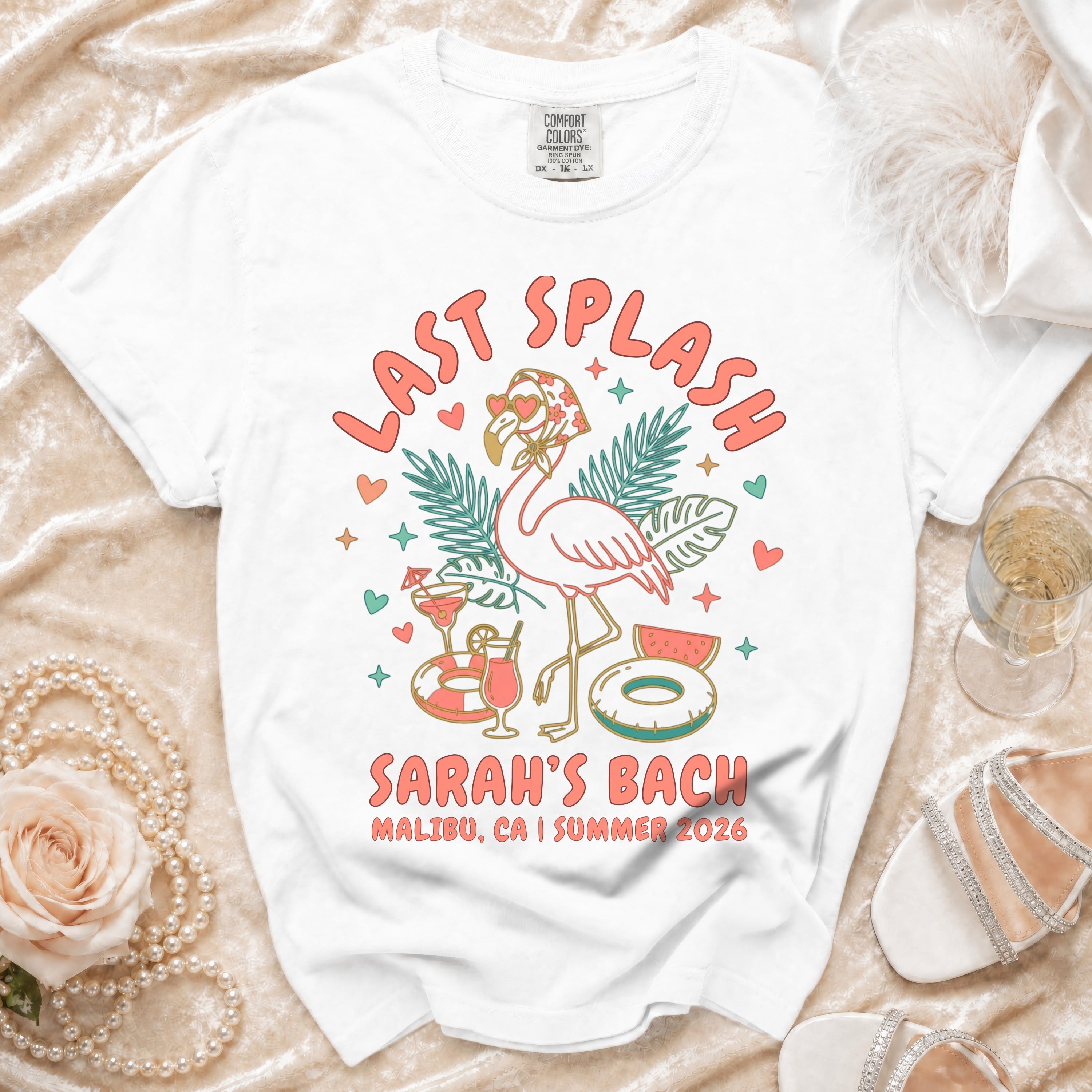 White t-shirt with "Last Splash Sarah's Bach Malibu CA Summer 2026" and flamingo graphic.
