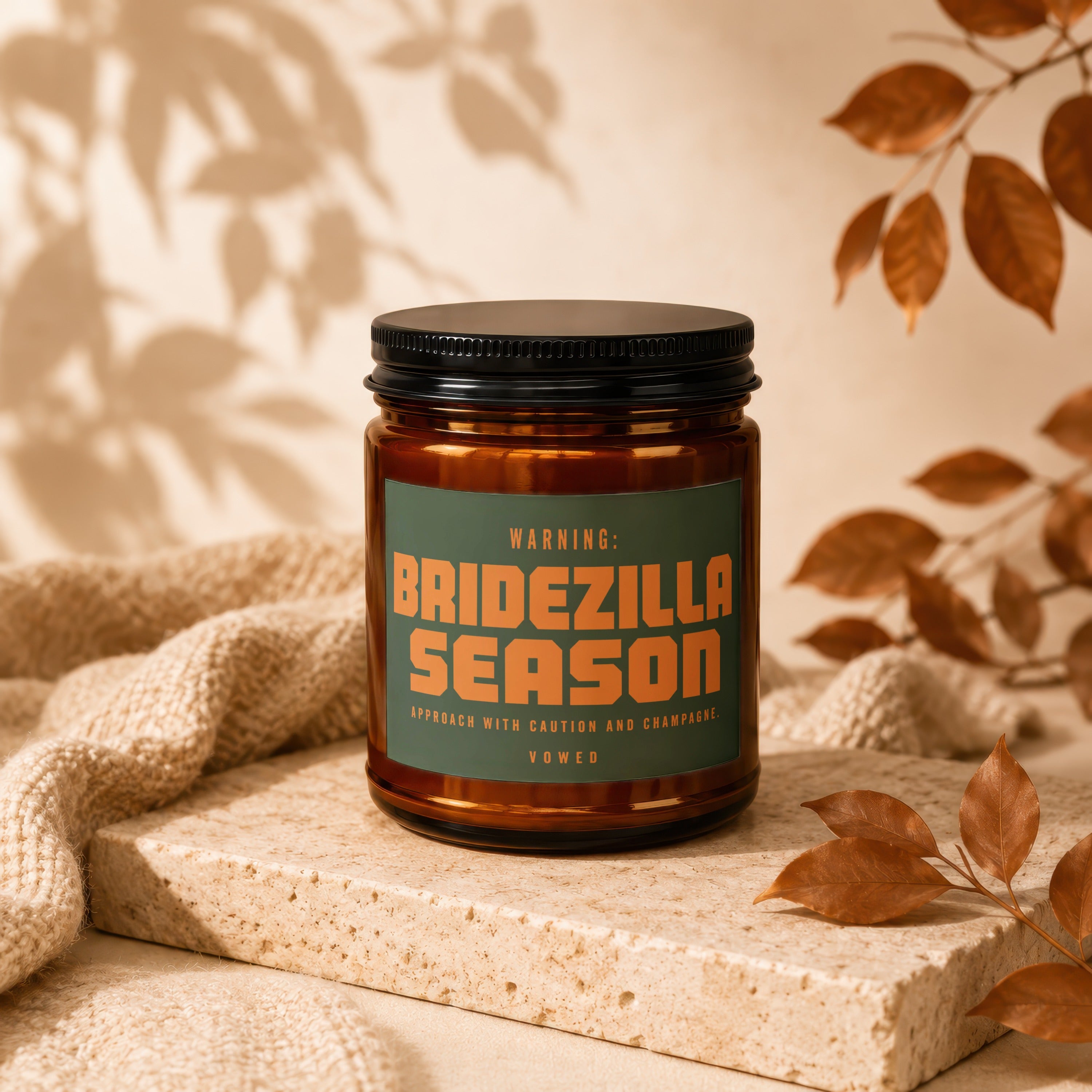 Brown candle with "Bridedzilla Season" label and text "Approach with caution and champagne."