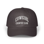 Dark grey baseball cap with white embroidered text reading COWGIRL COUNTRY CLUB centered on the front panels.