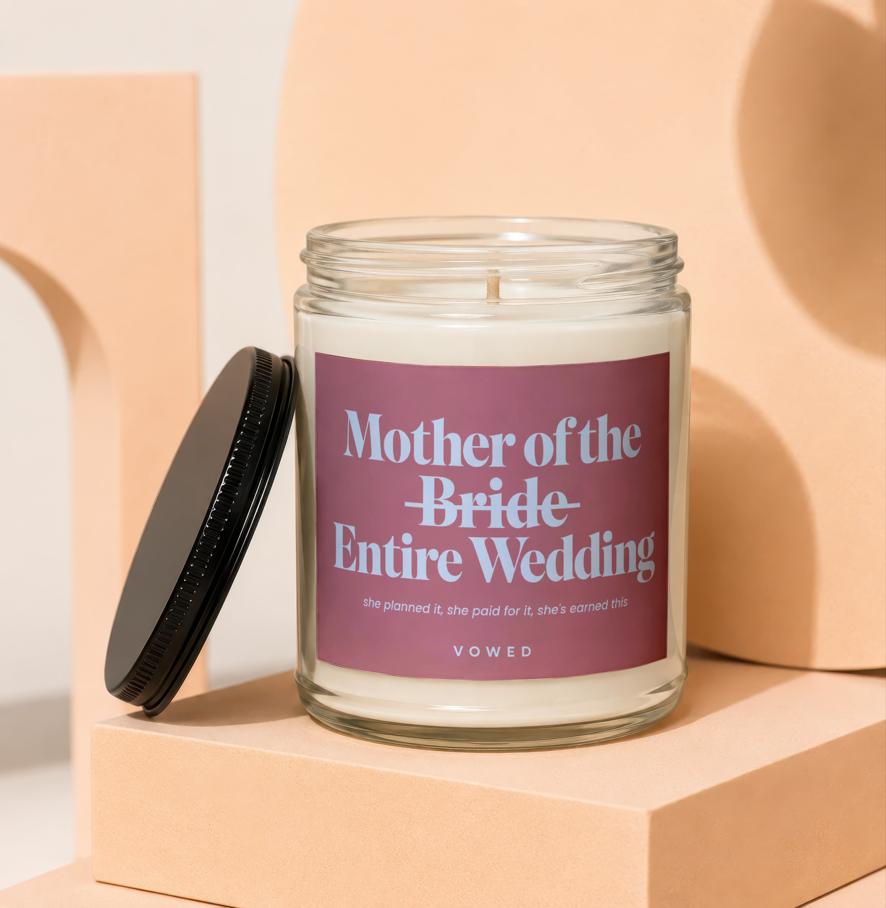Candle with "Mother of the Bride Entire Wedding" text and accompanying quote.