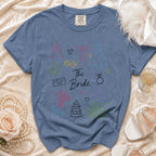 Blue t-shirt with "The Bride" text and wedding icons.