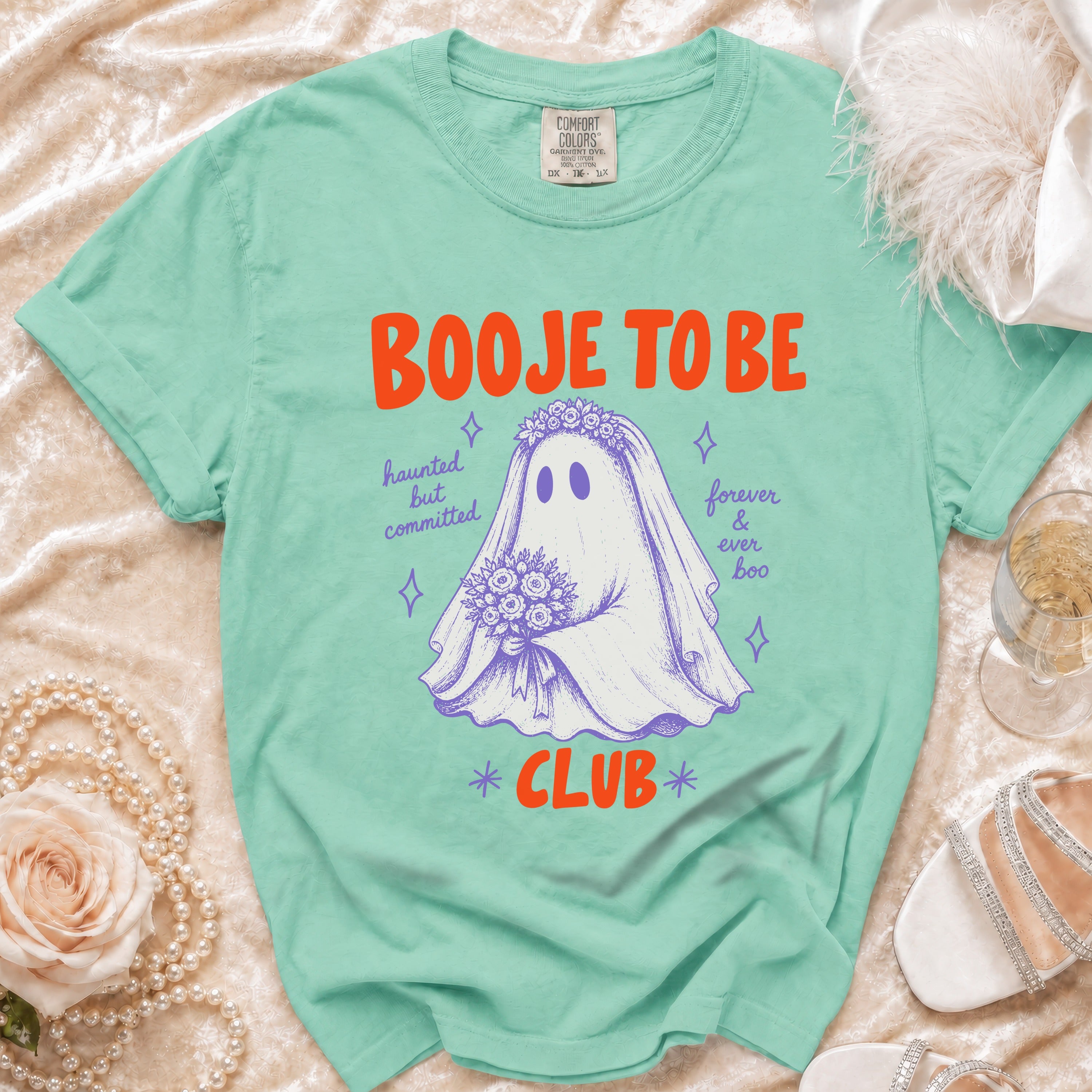 Mint green t-shirt with a ghost bride graphic and text "Booje to be Club."